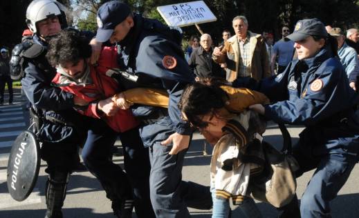 Police and a protester in Podgorica, Montenegro today (photo credit: Luka Zekovic/Vijesti.me)